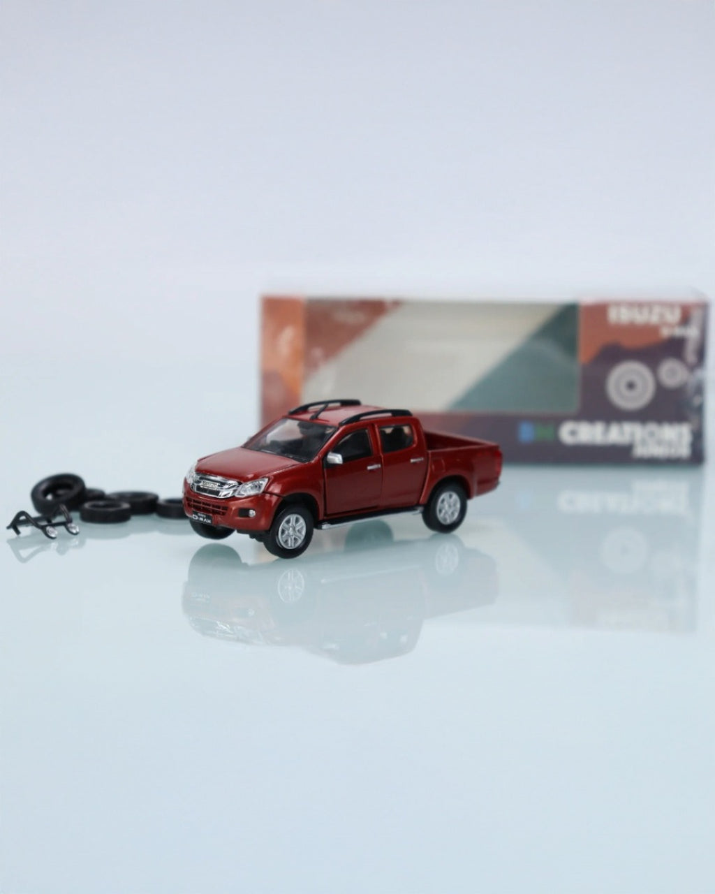 BM Creations - ISUZU D-Max 2016 Naranja con Piezas Intercambiables - Tomica Costa Rica Collectors Club