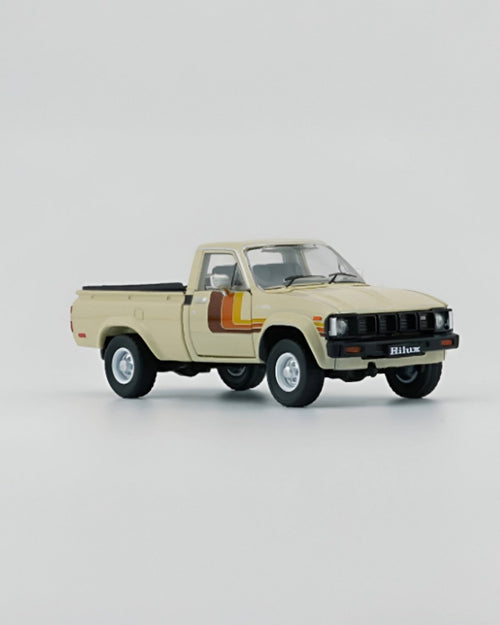 BM Creations - Toyota Hilux 1980 LHD Beige - Tomica Costa Rica Collectors Club