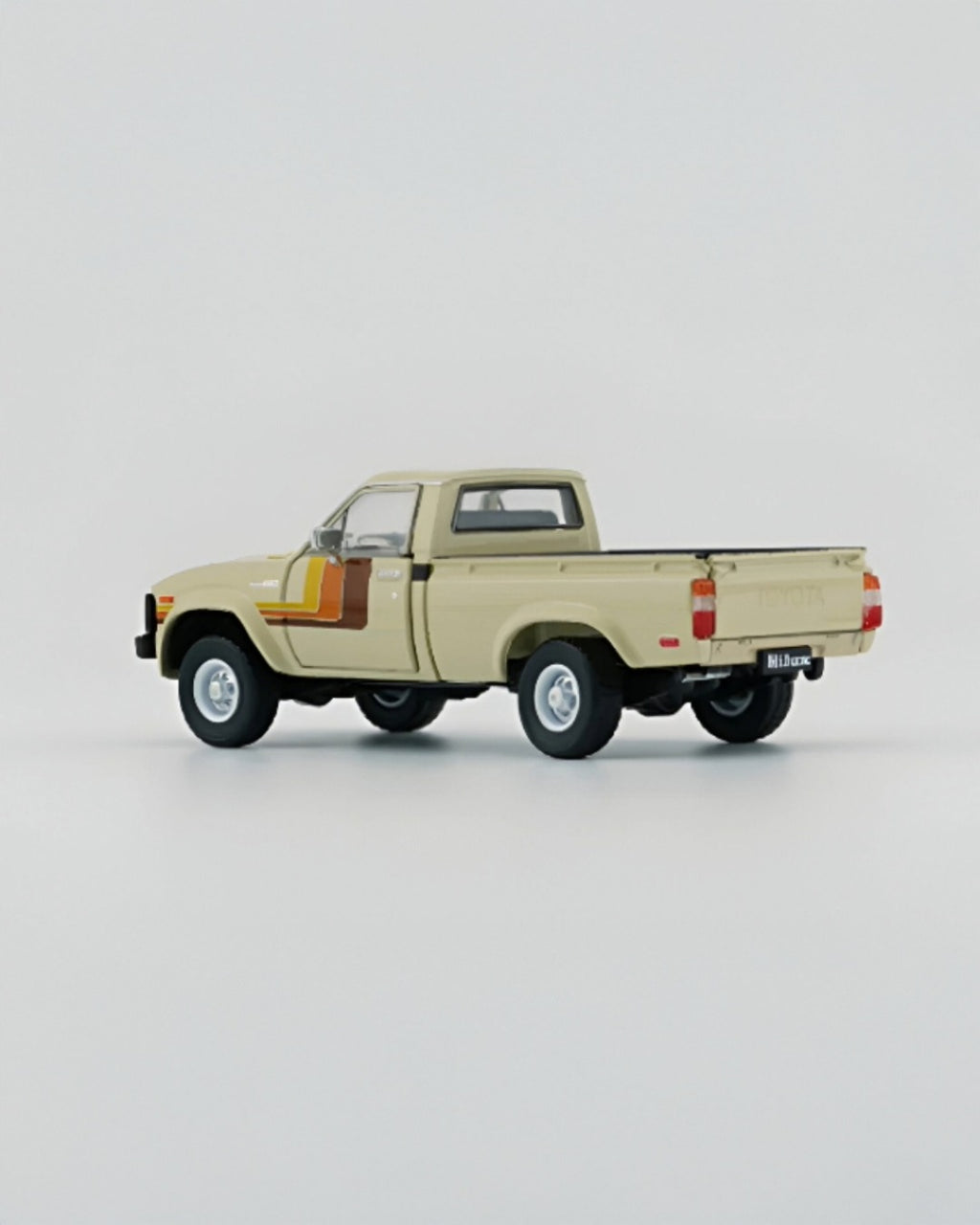BM Creations - Toyota Hilux 1980 LHD Beige - Tomica Costa Rica Collectors Club