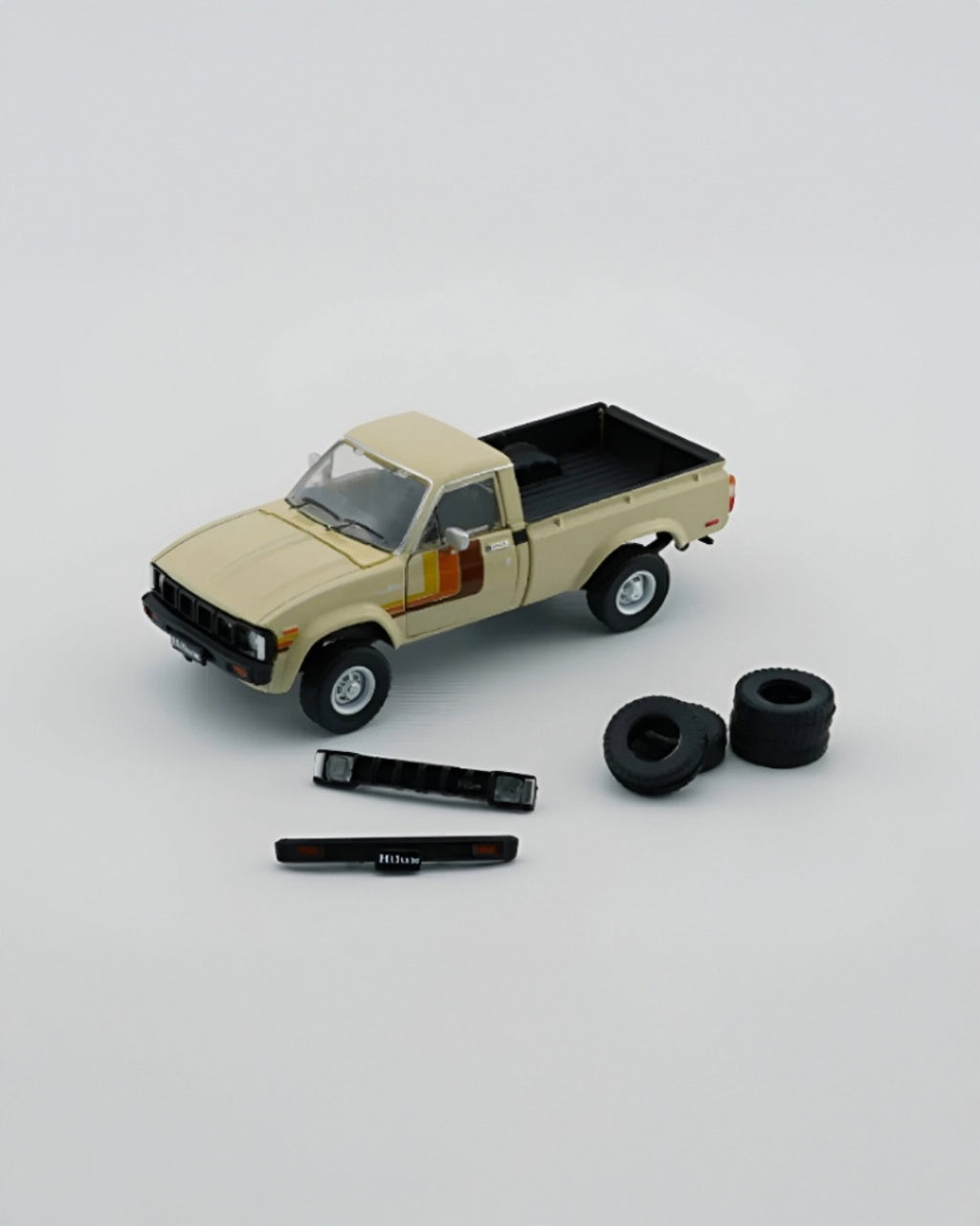 BM Creations - Toyota Hilux 1980 LHD Beige - Tomica Costa Rica Collectors Club