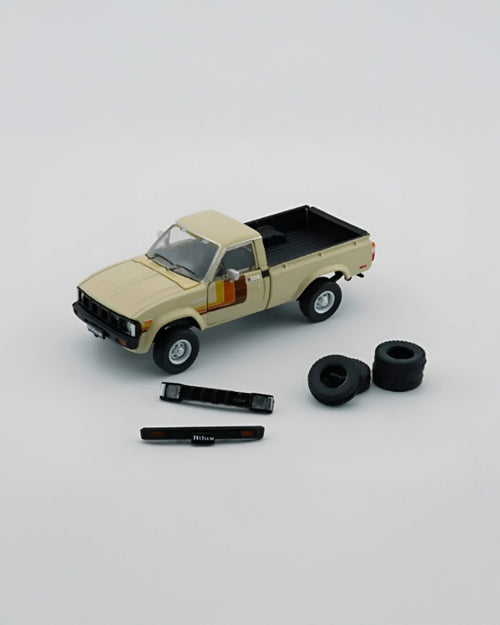 BM Creations - Toyota Hilux 1980 LHD Beige - Tomica Costa Rica Collectors Club